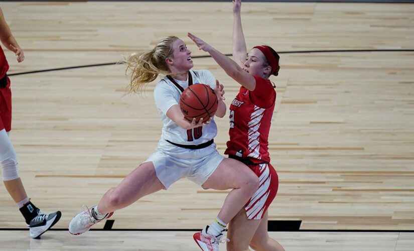 Louisville overcomes slow start to beat Marist 74-43