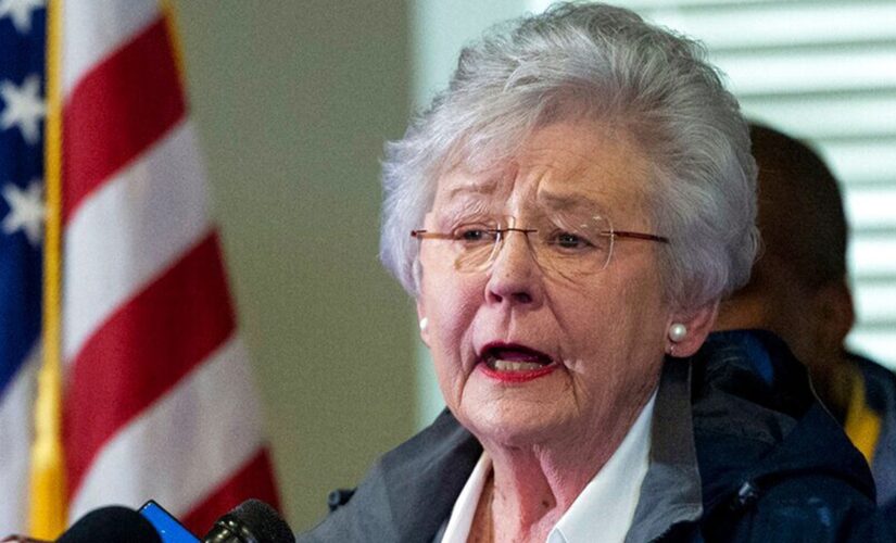 Resisting pressure, Alabama governor extends mask order