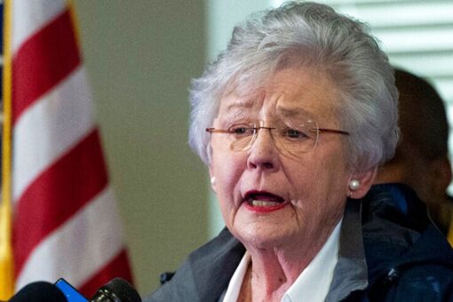 Resisting pressure, Alabama governor extends mask order