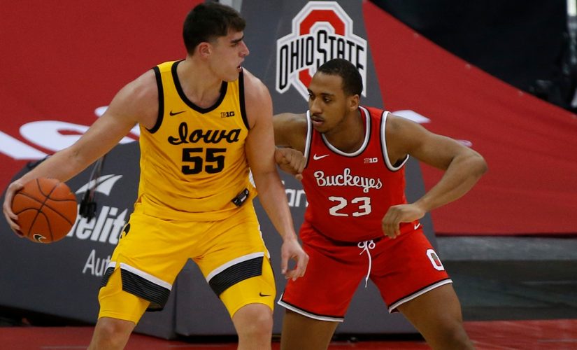 Garza, Weiskamp lead No. 9 Iowa over No. 4 Ohio State 73-57