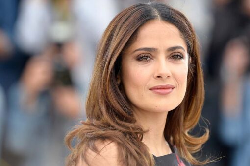 Salma Hayek shares Sunday morning beach photo in a purple one-piece