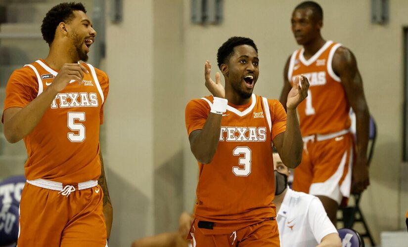 No. 15 Texas keeps road roll going with 76-64 win over TCU