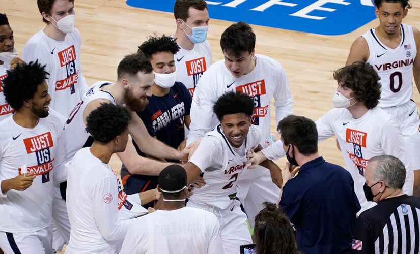Virginia, defending NCAA men’s basketball champs, out of ACC tournament over positive COVID-19 test