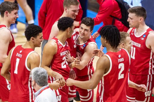 Wisconsin routs UNC, Williams falls to 29-1 in NCAA openers