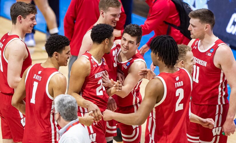 Wisconsin routs UNC, Williams falls to 29-1 in NCAA openers