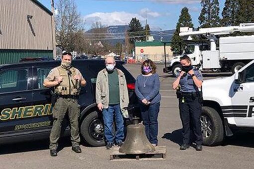 Bell from WWII-era Navy ship returned to Oregon homeowners months after wildfire theft