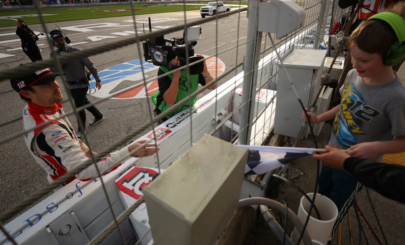 Viral videos show young NASCAR fan getting checkered flag from Ryan Blaney after Atlanta win