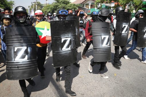 Burma police officer who refused to fire on protesters flees to India: report