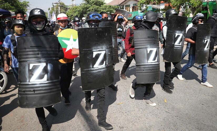 Burma police officer who refused to fire on protesters flees to India: report