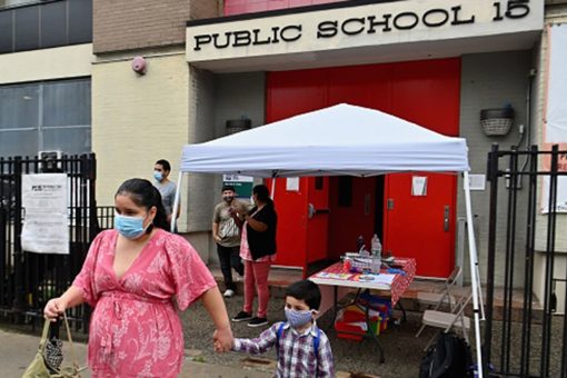 Biden directs states to prioritize educators in vaccine rollouts as he aims to reopen schools