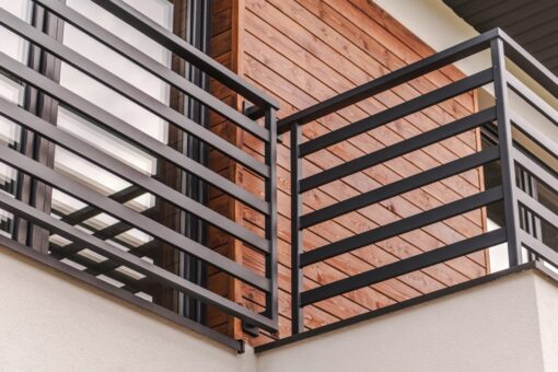 Bystander grabs man’s foot after he nearly falls off balcony, video shows