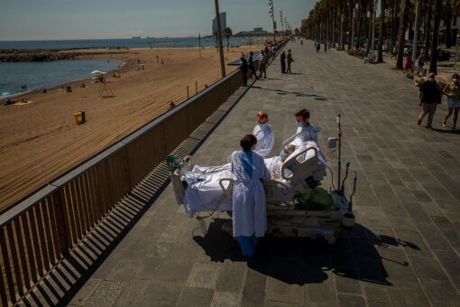 After year of coronavirus pandemic, weary world looks back — and forward
