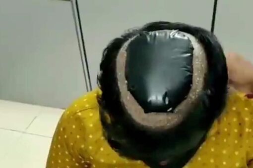 Travelers caught with gold hidden under toupees, in their socks