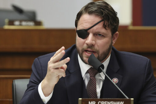 Dan Crenshaw returns to committee after eye surgery that left him blind