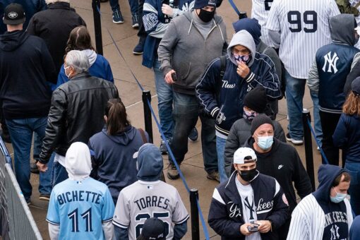 US draws close to 100M vaccinations as baseball resumes