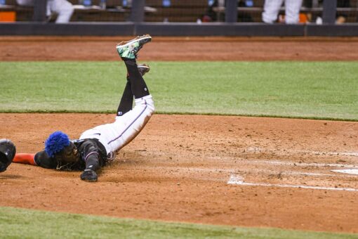 Marte helps Marlins rally for 1st win, 12-7 over Rays
