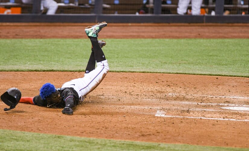 Marte helps Marlins rally for 1st win, 12-7 over Rays