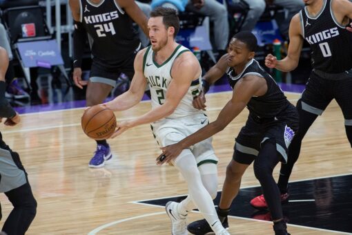 Bucks slip past Kings 129-128 without Antetokounmpo