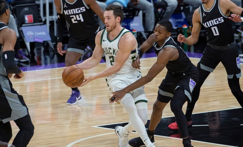 Bucks slip past Kings 129-128 without Antetokounmpo