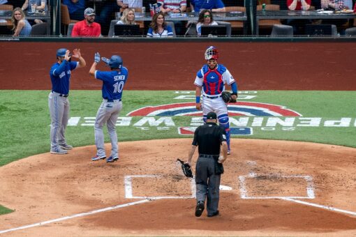 Blue Jays spoil Rangers home opener before largest MLB crowd
