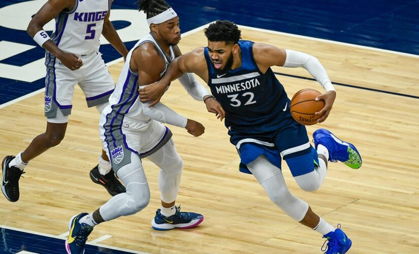 Russell returns with 25 points; Wolves beat Kings 116-106