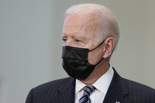 Biden leans close to tell man to socially distance, ‘which I’m not doing’