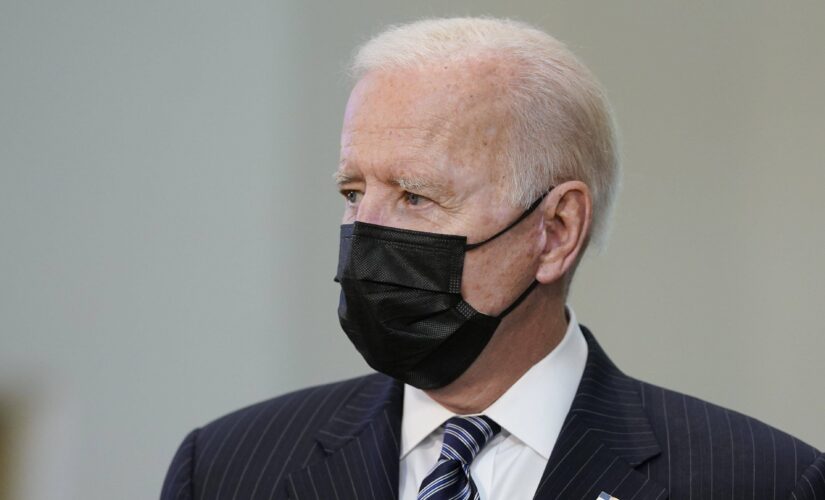 Biden leans close to tell man to socially distance, ‘which I’m not doing’