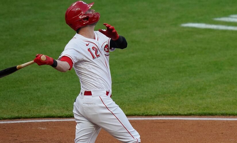 Naquin stars as Reds pound Pirates for 4th straight win