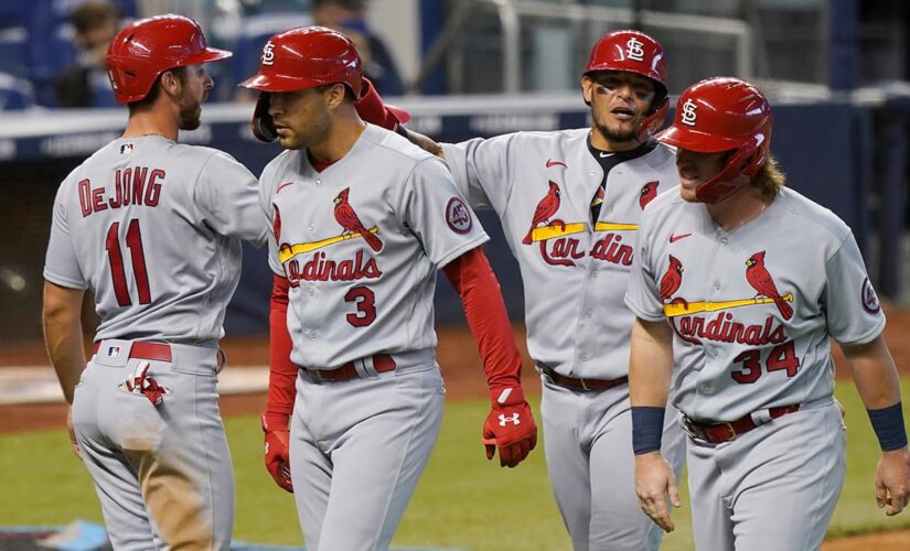 Molina HR, Carlson slam lead Cards over Marlins 7-0 & sweep