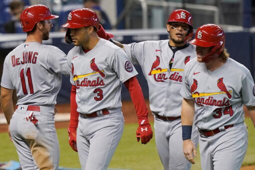 Molina HR, Carlson slam lead Cards over Marlins 7-0 & sweep