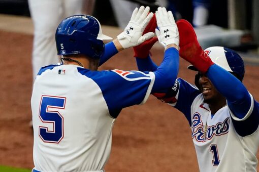 Freeman homers, drives in 3 as Braves edge Phillies 5-4