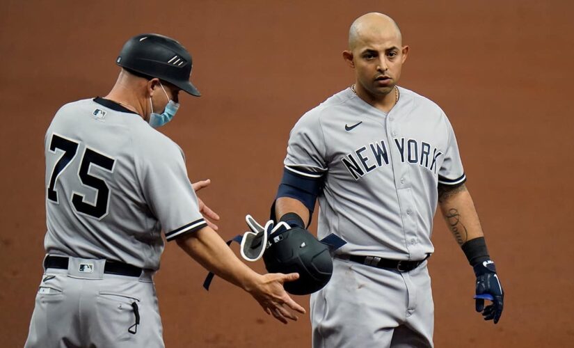 Odor snaps late tie with 1st hit as Yankee, NY tops Rays 8-4