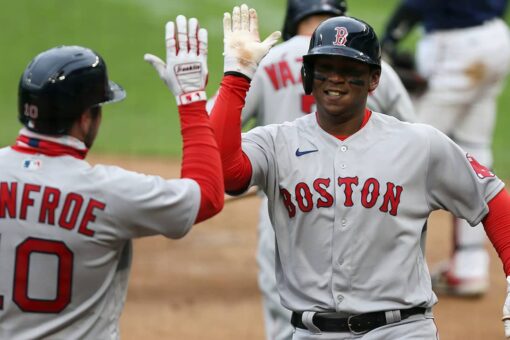 Devers, Bosox win snowy 7th in row; Twins hold silent moment