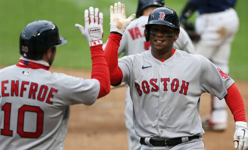 Devers, Bosox win snowy 7th in row; Twins hold silent moment