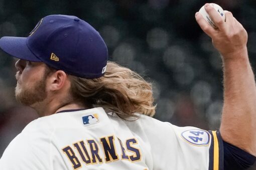 Burnes delivers with arm, bat as Brewers trounce Cubs 7-0