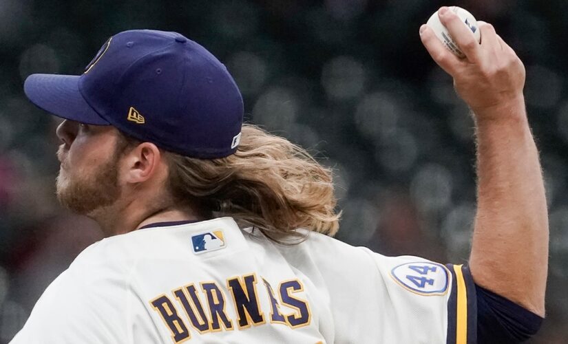 Burnes delivers with arm, bat as Brewers trounce Cubs 7-0