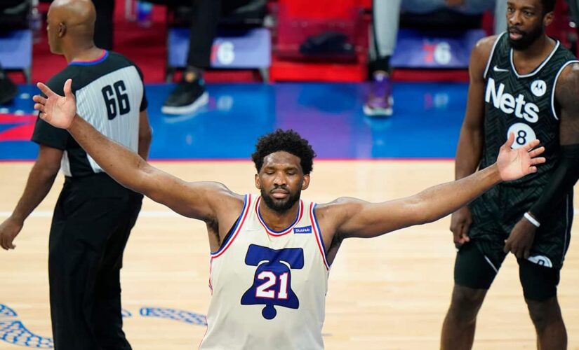 Embiid, 76ers top undermanned Nets 123-117 for 1st in East