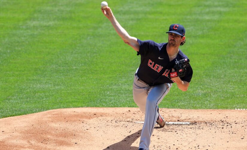 Bieber sets K record, fans 13 as Indians beat Reds 6-3