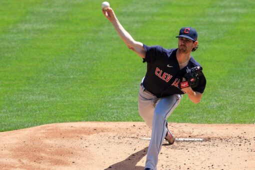Bieber sets K record, fans 13 as Indians beat Reds 6-3