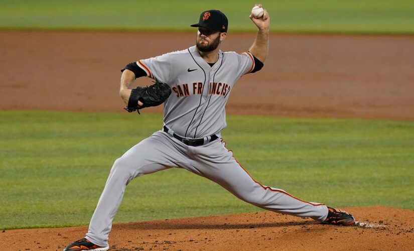 Wood, 4 relievers help Giants 3-hit Marlins in 1-0 win