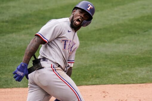 García’s 3-run homer in 8th sends Rangers past Angels 7-4