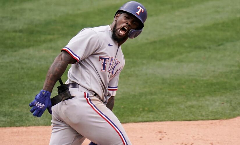 García’s 3-run homer in 8th sends Rangers past Angels 7-4