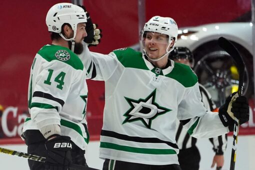 Benn scores in OT, lifts Stars to 2-1 win over Red Wings