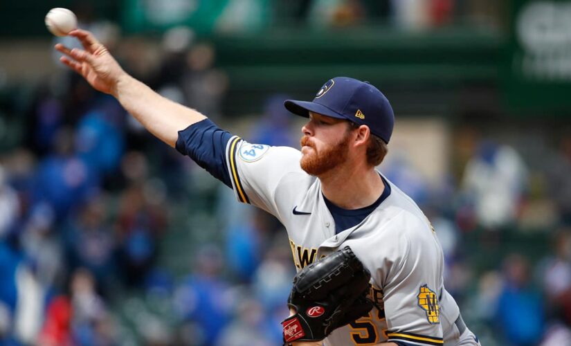 Woodruff works 6 innings as Brewers blank Arrieta, Cubs 6-0