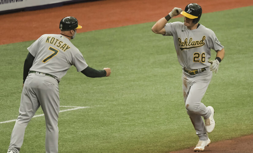 Chapman leads A’s over Rays 3-2 in McClanahan’s debut