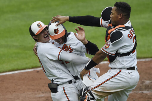 Mullins’ sac fly propels Orioles past Yankees 4-3 in 10