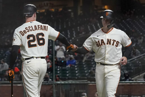 Posey hits 2-run homer, Giants pound Rockies in 12-0 rout