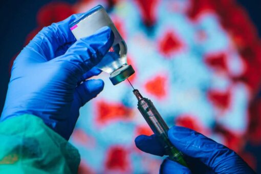 Half of US adults have received at least one COVID-19 shot
