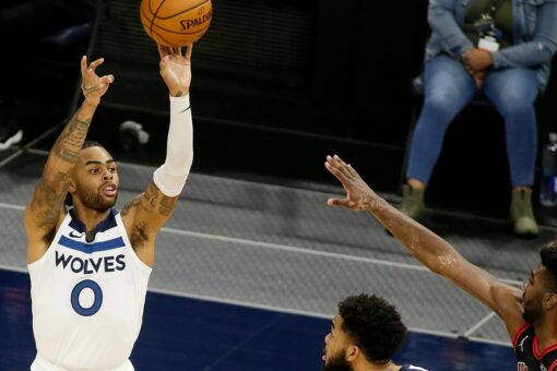 Towns, Russell push Wolves to 121-117 win against Bulls
