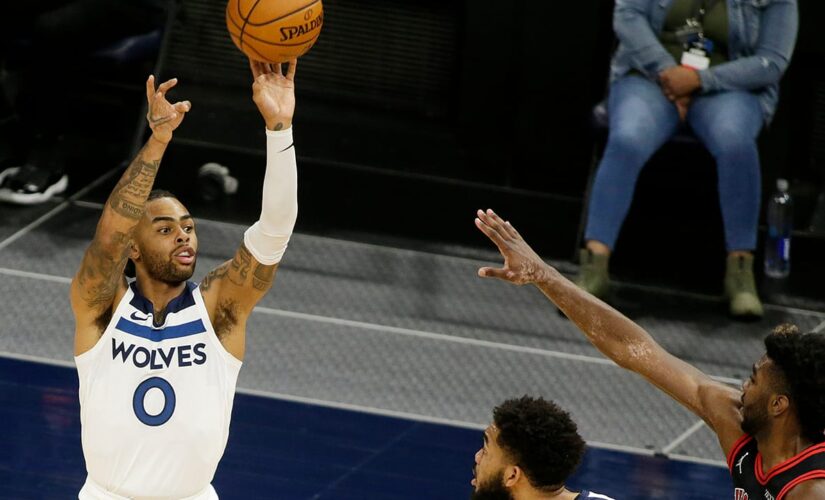 Towns, Russell push Wolves to 121-117 win against Bulls